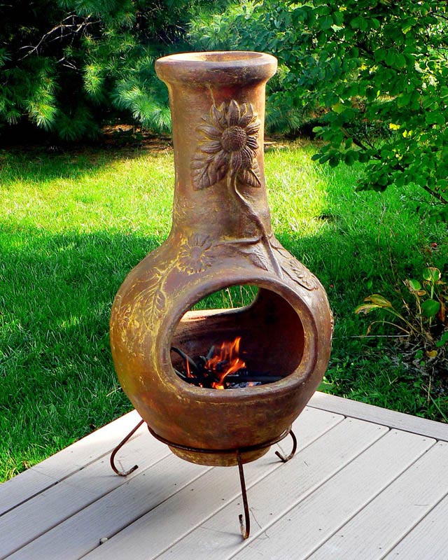 testing clay chimineas on wooden deck